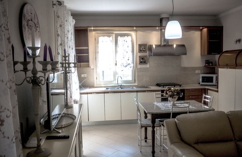 San Donato House | Ground floor villa apartment with garden and pool, 1 km from the city