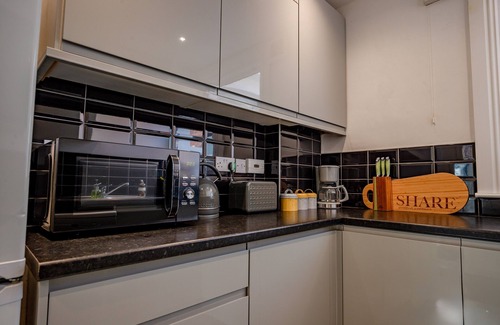 Tadworth Apartment | Guest Homes | Station Approach