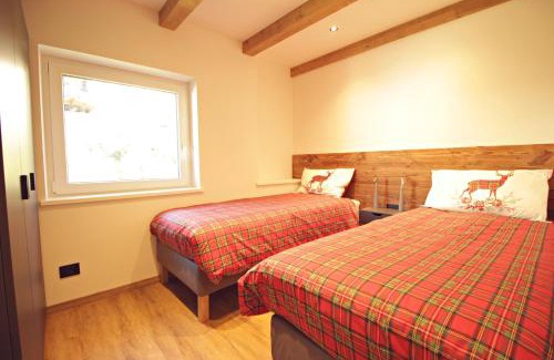 Castello-Molina di Fiemme Apartment | Guest House Dezulian