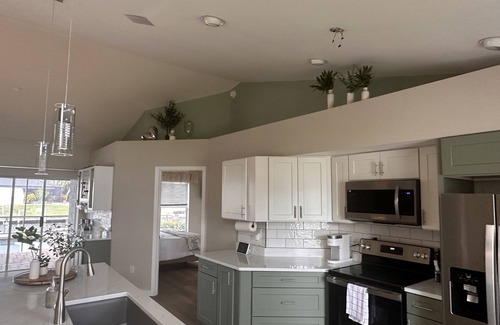 Caloosahatchee House | Gulf access water views while baking pizza on the lanai or riding the peloton!