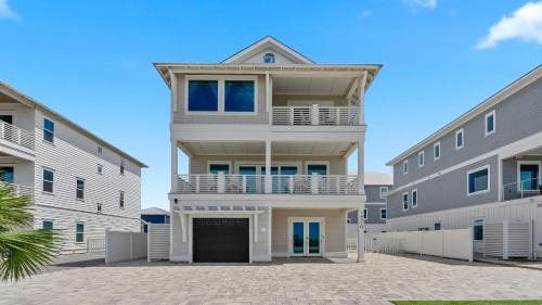 Bid-a-wee Beach House | Gulf Views Pool Rooftop Lounge Private Beach Heavenly Day by AvantStay