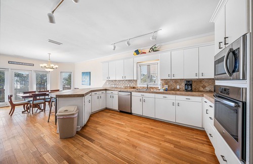 Audubon Place House | Gulfview home with outdoor shower, large deck, and internet