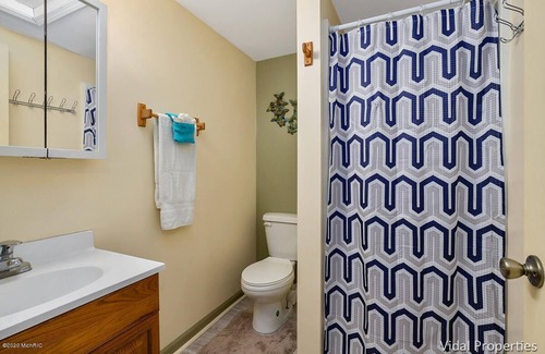 Shelbyville Cottage | Gun Lake Vacation Rental, Sandy beach, docks, picnic tables, kids play grounds