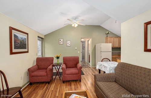 Shelbyville Cottage | Gun Lake Vacation Rental, Sandy beach, docks, picnic tables, kids play grounds