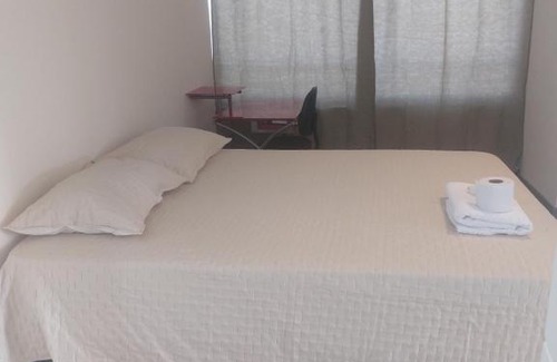 Macul House | Habitación con Mary y Nolberto