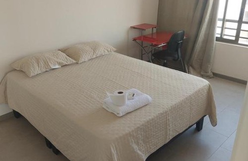 Macul House | Habitación con Mary y Nolberto