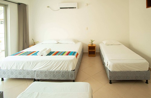 Covenas Hotel | Habitación Superior Familiar Con Balcón Cerca A La Playa