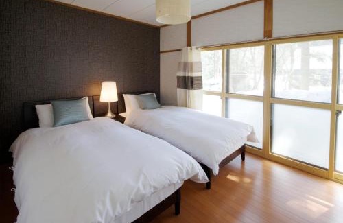 Iida Ski Chalet | Hakuba Forest House by JAMSZ ROYALE