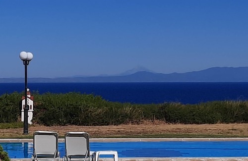Nea Propontida Villa | Halkidiki Blue Pastel, a cliff villa with wide sea view, and large shared pool