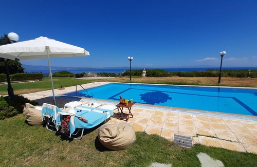 Nea Propontida Villa | Halkidiki Blue Pastel, a cliff villa with wide sea view, and large shared pool