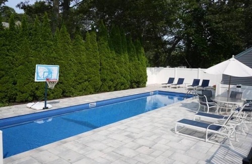 Hampton Bays House | Hampton Bays Getaway! Heated Pool, Playground, Firepit, Gameroom & lots more!