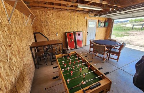 Peyton House | Hawkeye Outdoor Adventures Game Room Hot tub