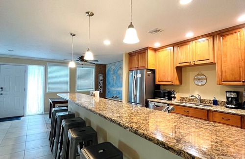 Cocoa Isles House | Heated Pool and Spa-3B/2B Waterfront on Canal close to the Beach