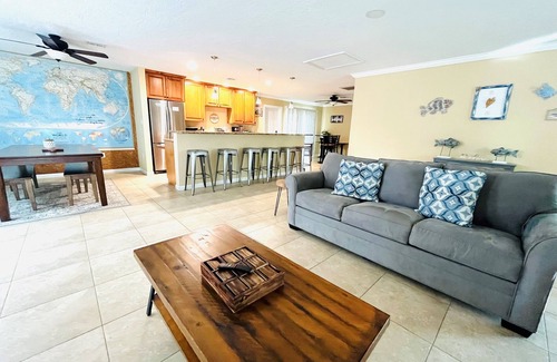 Cocoa Isles House | Heated Pool and Spa-3B/2B Waterfront on Canal close to the Beach
