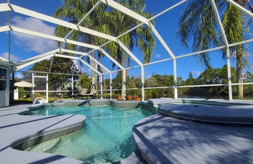 West Melbourne House | Heated pool, lakeview, double king size, 4 bedrooms, 6 beds, 2 bath, sleep 12