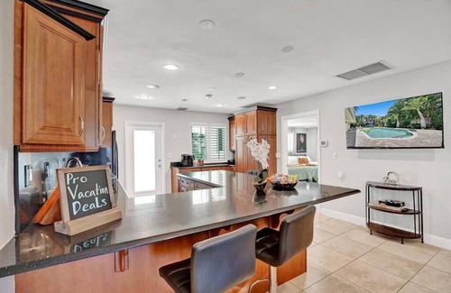 Oakland Park Villa | Heated Pool Tropical Oasis Water Slide