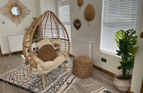 Storwood House | Hedgehog Lodge at Owlet Hideaway - with Hot Tub, near York