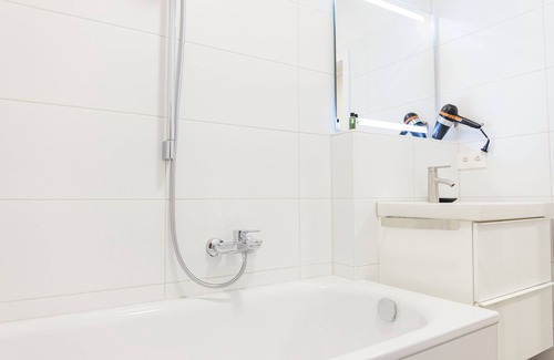 Scheidegg Apartment | Heimatel family studio including pool and sauna with a large terrace