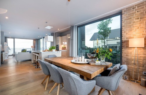 Olpenitz Apartment | "Heimathafen 2" vacation apartment with sauna, south-facing terrace & roof terrace by the water