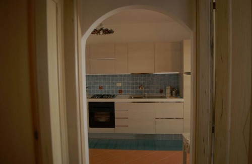 Lu Bagnu Apartment | Helichrysum House - Holiday House with terrace overlooking the Gulf of Asinara