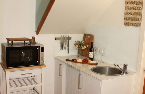 Bar Beach Apartment | Hideaway apartment in bustling beachside suburb, short walk to city attractions