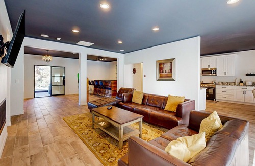 The Village Ski Chalet | Hillside Hideaway ~ Dog-friendly home with wraparound deck, grill, game room, & bar - walk to dining