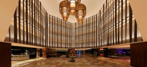 Embassy Golf Links Business Park Hotel | Hilton Bangalore Embassy GolfLinks