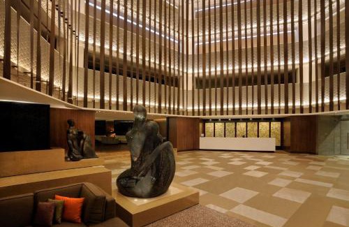 Embassy Golf Links Business Park Hotel | Hilton Bangalore Embassy GolfLinks