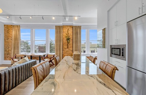 Downtown Condo | Historic Loft on Palafox | Luxury Stay in the Center of It All