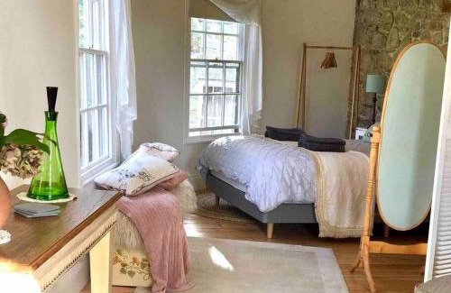 Helston Apartment | Historic school room