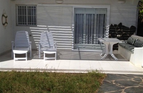 Playa del Aguila House | Holiday Home "Nueva Baviera 42" by the Sea with Garden & Shared Pool