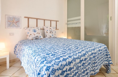 Puntone Apartment | Holiday Apartment 'Corallo' with Sea View, Garden, Balcony & Wi-Fi