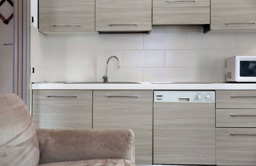 Livigno Apartment | Holiday Apartment "Arcobaleno Viola" with Mountain View, Wi-Fi & Garden
