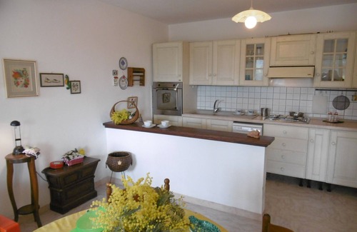 Capoliveri Apartment | Holiday Apartment "Il Giardino Nel Sole Bilo" with Air Conditioning, Garden and Terrace