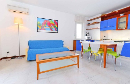 Lignano Sabbiadoro Apartment | Holiday apartment with balcony, air conditioning and internet