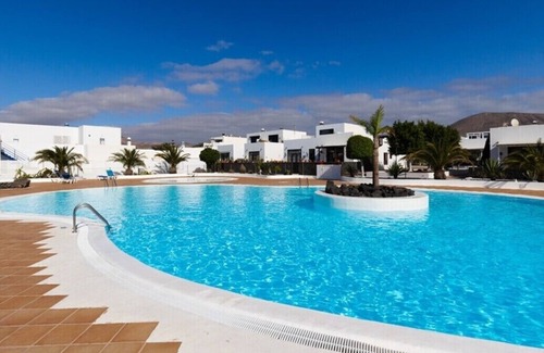 Puerto Calero House | Holiday home at the harbour of Puerto Calero with roof terrace, garden and pool