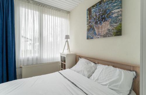 Baarland House | Holiday Home in Zeeland near Lake