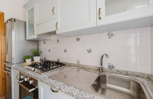 Torre dei Corsari House | Holiday Home 'Domu De Maria' with Sea View, Private Terrace and Air Conditioning