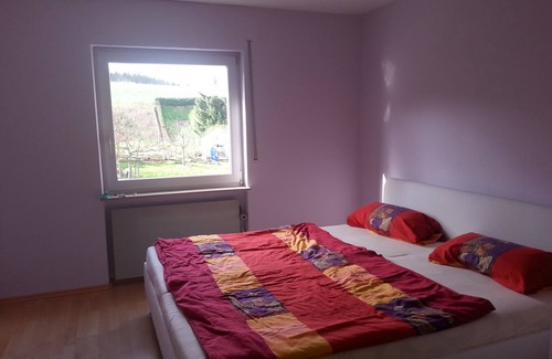 Mariaroth Apartment | Holiday room with two common rooms and shared bathroom / kitchen.