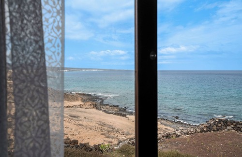 Haria Villa | Holiday Villa 'Playa Marina Eco Beach' with Sea Views, Shared Pool and Wi-Fi