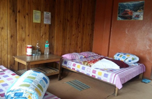 Rishop Cabin | Hollyhocks