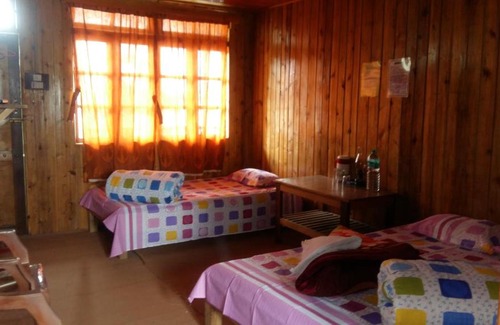 Rishop Cabin | Hollyhocks