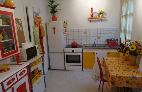 Ribeauville House | Home and garden in vibrant colored frame ready villagers living