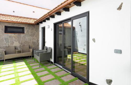 La Guancha Ski Chalet | Home2Book Rustic Stone Haven with Terrace