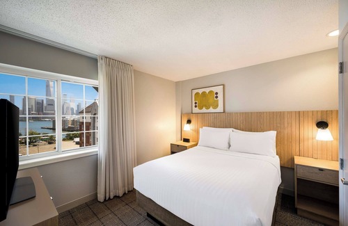Exchange Place North Hotel | Homelike Staycation with Full Kitchen, Onsite Parking, Pets are Welcome!