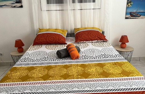 Capesterre-Belle-Eau House | Homerez - House 2 km away from the beach for 4 ppl. with shared pool and garden