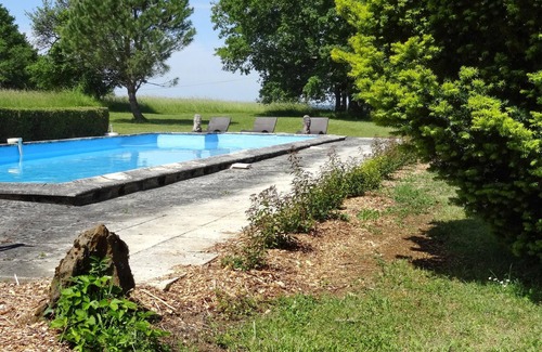 Saint-Amand-de-Coly House | Homerez - House for 10 ppl. with swimming-pool and garden at Saint-Amand-de-Coly