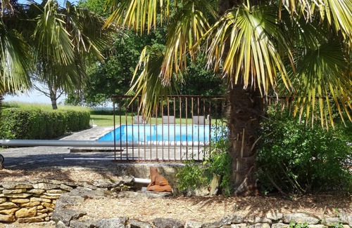 Saint-Amand-de-Coly House | Homerez - House for 10 ppl. with swimming-pool and garden at Saint-Amand-de-Coly