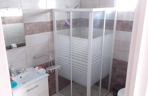 Damencourt House | Homerez - House for 2 pers. with shared pool, garden and balcony in Le Moule