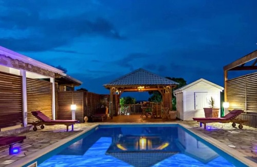 Anse-Bertrand House | Homerez - House for 2 ppl. with shared pool, jacuzzi and garden at Anse-Bertrand